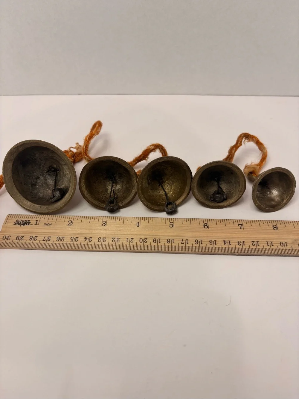 🔔 Vintage Graduated Brass Bells on Rope Garland – Rustic Temple Cow Bells – 24